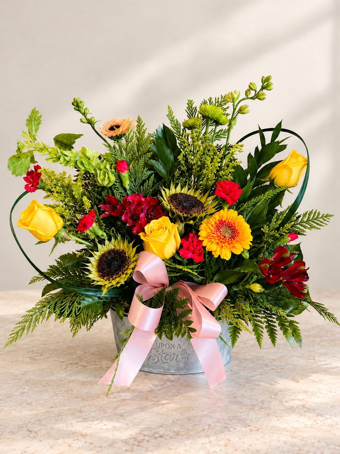 Colorful floral arrangement with greenery 1.png