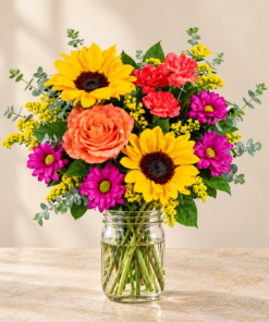 Elegant bouquet in a clear mason jar 1.png