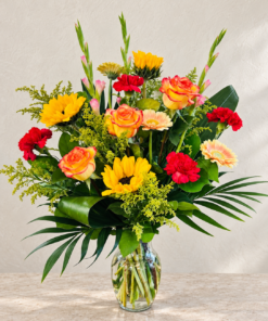 Sunlit Floral Arrangement on Stone 1.png
