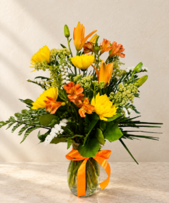 Warm Floral Arrangement on Neutral Stone 1.png