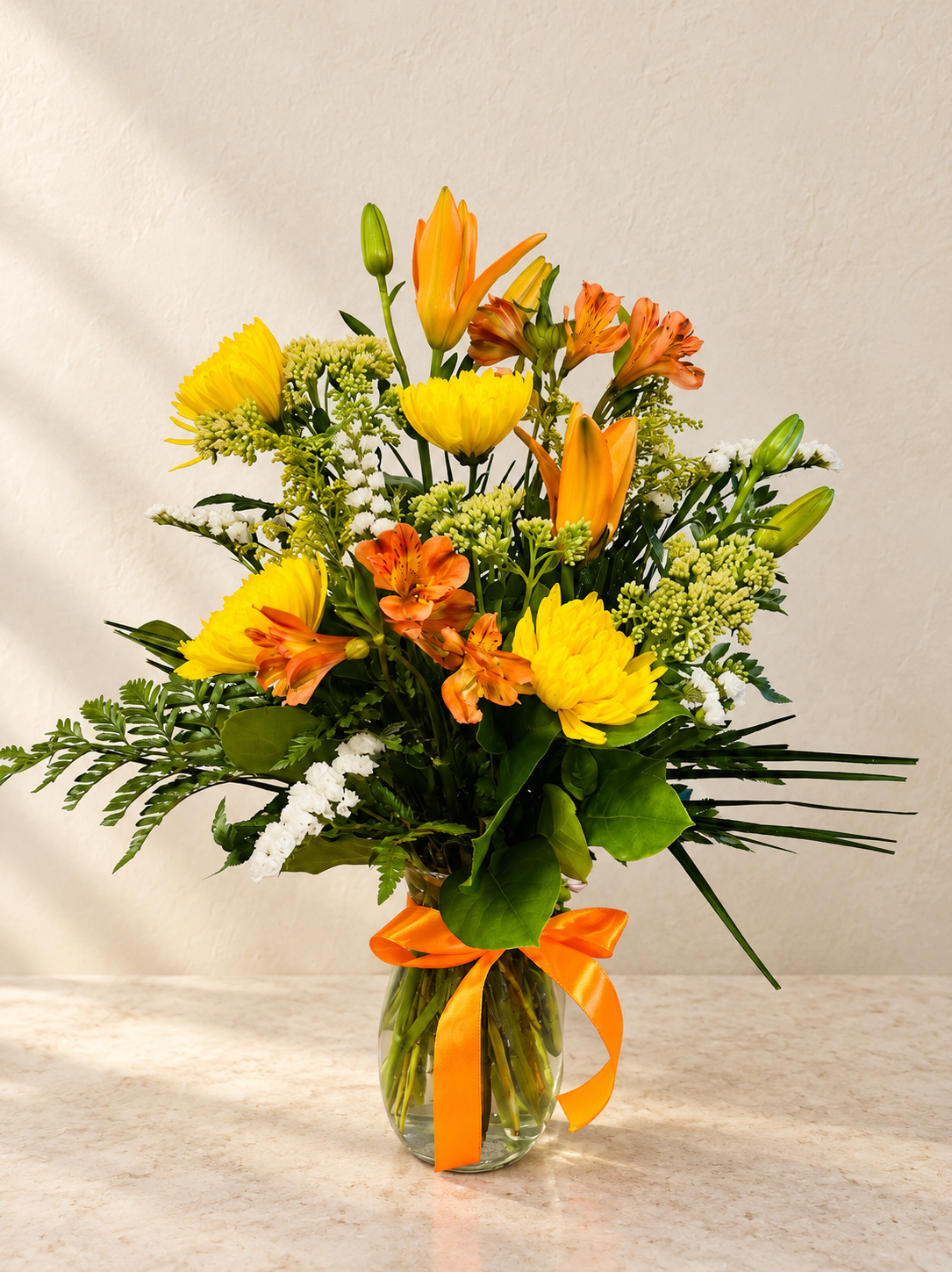 Warm Floral Arrangement on Neutral Stone 1.png